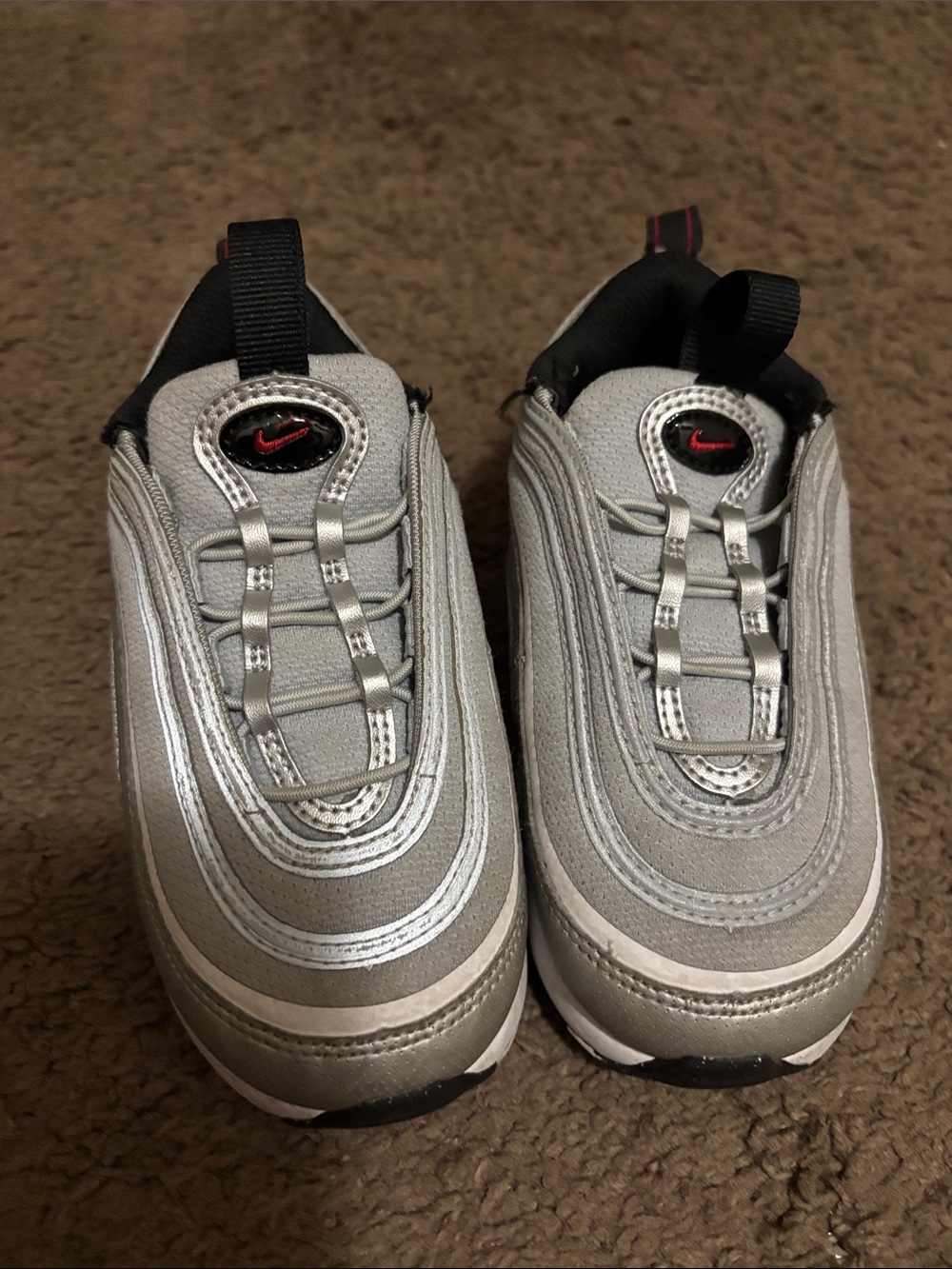 Nike Silver and Black Low-Top Sneakers with Red Accents